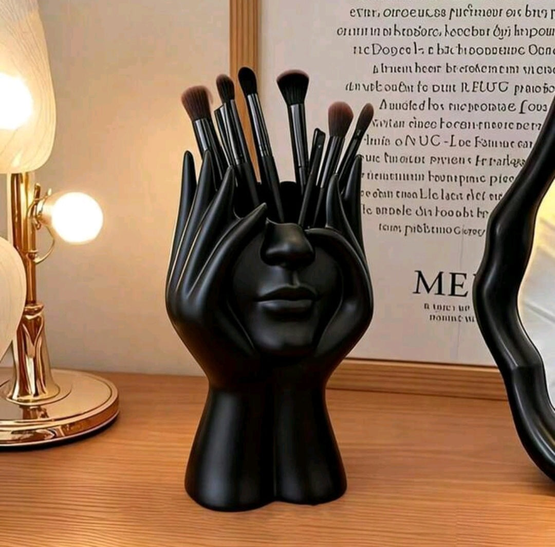 Makeup brushes including brush holder